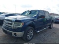 2014 Ford F-150 — photo 2 of 14 | VIN 1FTFW1CF1EKD80038