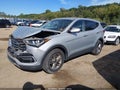 2017 Hyundai Santa Fe — photo 2 of 16 | VIN 5XYZTDLB6HG385444