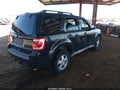 2010 Ford Escape — photo 4 of 10 | VIN 1FMCU9D76AKC28518