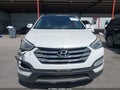 2013 Hyundai Santa Fe — photo 13 of 17 | VIN 5XYZU3LB9DG089870