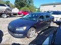 2013 Volkswagen Passat — photo 2 of 11 | VIN 1VWCM7A32DC081085