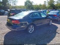 2013 Volkswagen Passat — photo 4 of 11 | VIN 1VWCM7A32DC081085