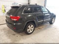 2013 Jeep Grand Cherokee — photo 4 of 11 | VIN 1C4RJFAG7DC549279