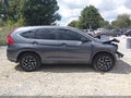 2016 Honda CR-V — photo 13 of 16 | VIN 2HKRM4H4XGH650784