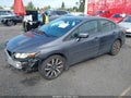 2015 Honda Civic — photo 2 of 17 | VIN 2HGFB2F97FH511331