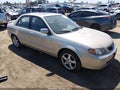 2002 Mazda Protege — photo 1 of 11 | VIN JM1BJ225720525831