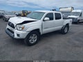 2015 Toyota Tacoma — photo 2 of 16 | VIN 3TMLU4EN4FM191022