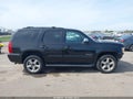 2011 Chevrolet Tahoe — photo 14 of 17 | VIN 1GNSKAE08BR262534