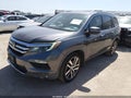 2016 Honda Pilot — photo 2 of 16 | VIN 5FNYF5H95GB034433