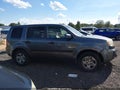 2011 Honda Pilot — photo 13 of 16 | VIN 5FNYF4H20BB051243