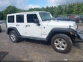 2014 Jeep Wrangler Unlimited — photo 13 of 16 | VIN 1C4HJWEG5EL262076