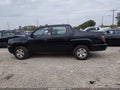 2012 Honda Ridgeline — photo 14 of 16 | VIN 5FPYK1F28CB458653