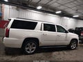 2015 Chevrolet Suburban 1500 — photo 13 of 17 | VIN 1GNSKJKC7FR536472