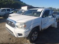 2015 Toyota Tacoma — photo 2 of 16 | VIN 5TFUX4EN4FX030482