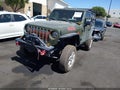 2022 Jeep Wrangler — photo 2 of 17 | VIN 1C4GJXAG0NW154213