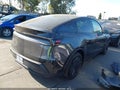 2026 Tesla Model Y — photo 4 of 22 | VIN 7SAYGDED8TF641567