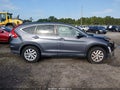 2015 Honda CR-V — photo 13 of 16 | VIN 2HKRM3H59FH529584