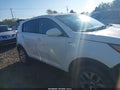 2016 Kia Sportage — photo 13 of 16 | VIN KNDPBCAC8G7880224
