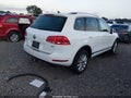 2014 Volkswagen Touareg — photo 4 of 17 | VIN WVGEF9BP8ED014873