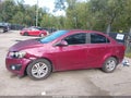 2014 Chevrolet Sonic — photo 14 of 16 | VIN 1G1JC5SB5E4110865