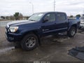 2012 Toyota Tacoma — photo 2 of 15 | VIN 5TFJU4GN3CX028274