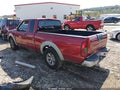 2001 Nissan Frontier — photo 3 of 11 | VIN 1N6DD26S11C402519