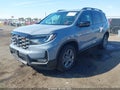 2025 Honda Passport — photo 2 of 16 | VIN 5FNYF8H64SB019115