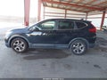 2018 Honda CR-V — photo 14 of 16 | VIN 7FARW1H53JE031293