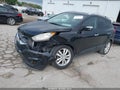 2012 Hyundai Tucson — photo 2 of 16 | VIN KM8JUCAC6CU381610