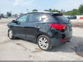 2012 Hyundai Tucson — photo 3 of 16 | VIN KM8JUCAC6CU381610