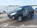 2013 Hyundai Tucson — photo 2 of 16 | VIN KM8JU3AC6DU704040