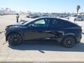 2022 Tesla Model Y — photo 14 of 16 | VIN 7SAYGDEF0NF538793