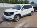 2014 Volkswagen Tiguan — photo 2 of 16 | VIN WVGAV3AX7EW555465