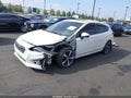 2018 Subaru Impreza — photo 2 of 22 | VIN 4S3GTAM61J3732793
