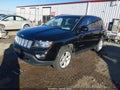 2015 Jeep Compass — photo 2 of 16 | VIN 1C4NJDEB1FD370735