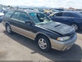 1999 Subaru Legacy — photo 1 of 17 | VIN 4S3BG6854X7607608