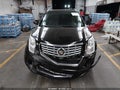 2016 Cadillac SRX — photo 12 of 16 | VIN 3GYFNCE31GS580632