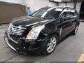 2016 Cadillac SRX — photo 2 of 16 | VIN 3GYFNCE31GS580632