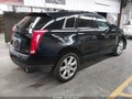 2016 Cadillac SRX — photo 4 of 16 | VIN 3GYFNCE31GS580632