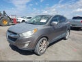 2011 Hyundai Tucson — photo 2 of 11 | VIN KM8JUCAC0BU252910