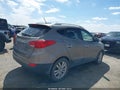 2011 Hyundai Tucson — photo 4 of 11 | VIN KM8JUCAC0BU252910