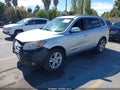 2012 Hyundai Santa Fe — photo 2 of 12 | VIN 5XYZK4AG4CG106177