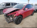 2020 Tesla Model Y — photo 2 of 16 | VIN 5YJYGDEF4LF003699
