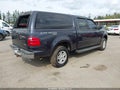 2001 Ford F-150 — photo 4 of 11 | VIN 1FTRW08L31KA22326