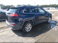 2014 Jeep Cherokee — photo 4 of 11 | VIN 1C4PJLDS9EW258451