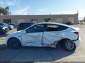 2023 Tesla Model Y — photo 14 of 16 | VIN 7SAYGDEE2PF745017
