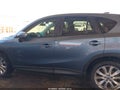 2015 Mazda CX-5 — photo 14 of 16 | VIN JM3KE2DY0F0512931