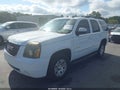 2007 GMC Yukon — photo 2 of 11 | VIN 1GKFC13017J289899
