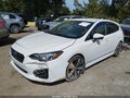 2018 Subaru Impreza — photo 6 of 16 | VIN 4S3GTAK63J3736380
