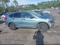 2016 Honda CR-V — photo 13 of 16 | VIN 2HKRM3H49GH561914
